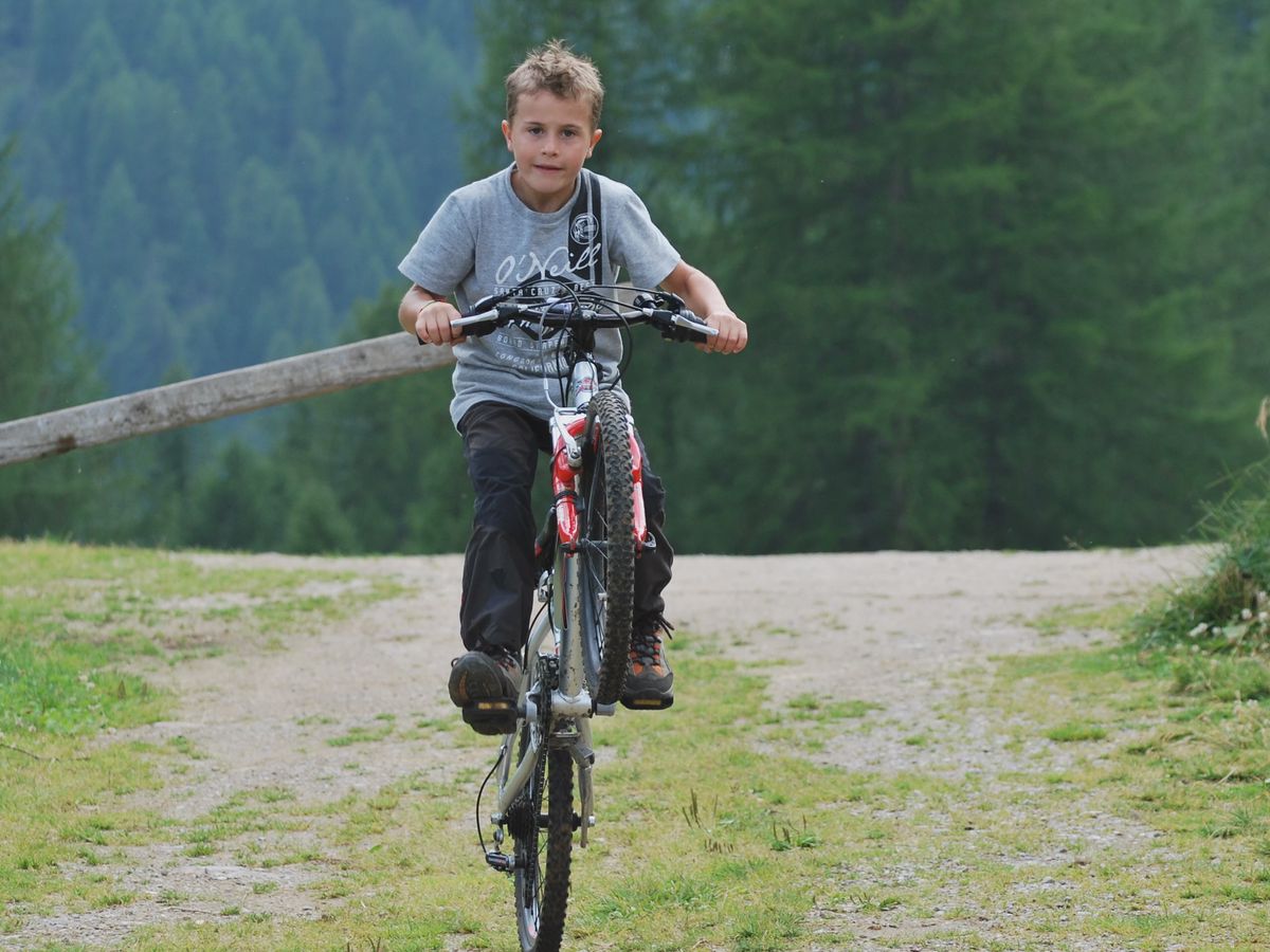 Wheelie on bike as a kid